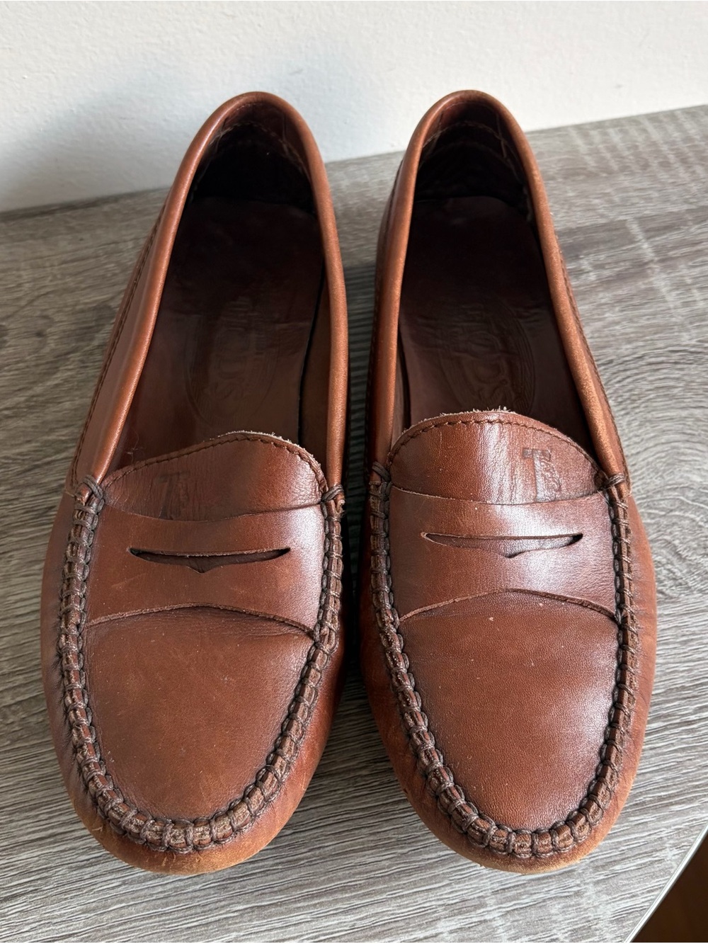 TOD’S brown driving loafers